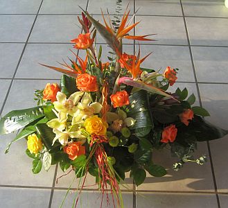 Wedding gift flowers arrangement made of  strelizia, cymbidium orchids, santini, roses, aspidistra